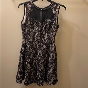 Nude mini dress with black lace overlay
